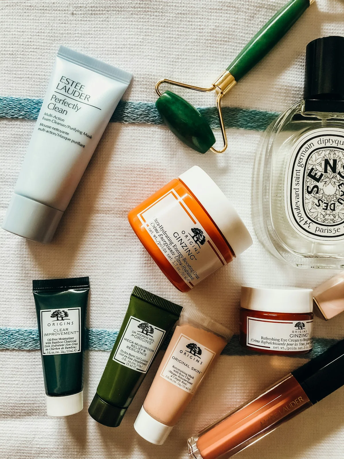 Skincare containers with a jade roller
